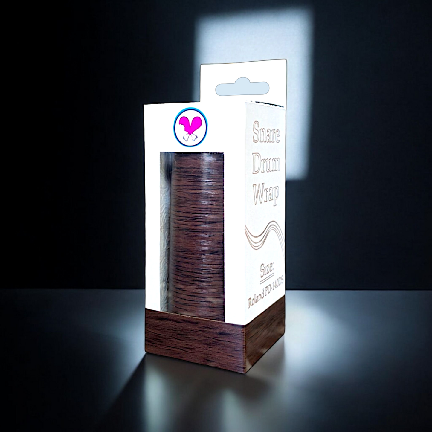 Custom textured maple wood grain vinyl snare drum wrap in its retail box packaging, highlighting the product's branding and secure packaging for drummers looking to enhance their snare drum's appearance. This custom snare wrap size fits a Roland PD-140DS electronic snare drum.