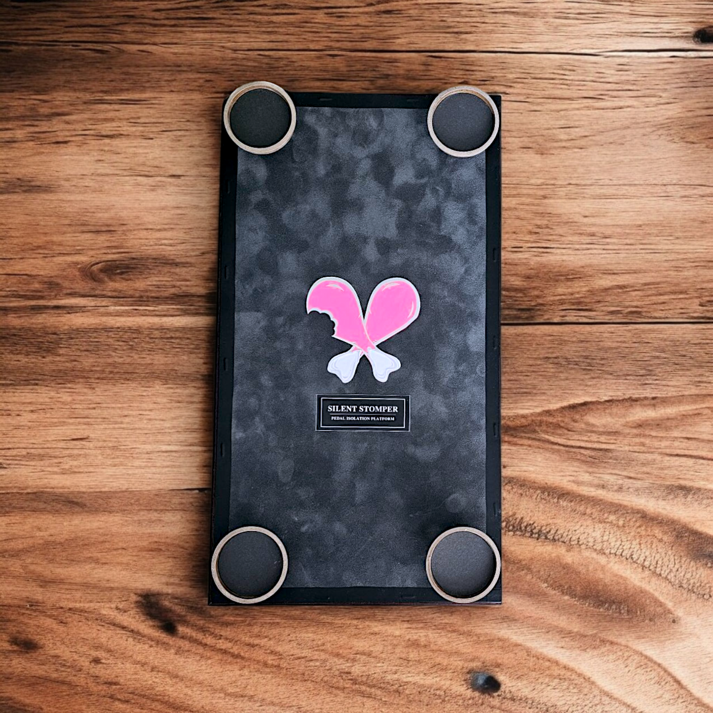Bottom of a Silent Stomper LITE impact noise isolation platform designed for drummers, enabling quiet practice in enclosed spaces like apartment buildings by reducing vibrations and preventing noise disturbances for neighbors.